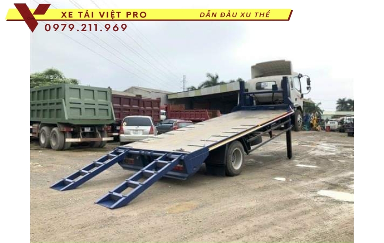 Xe tải JAC N900 nâng đầu chở máy công trình có giá bao nhiêu?