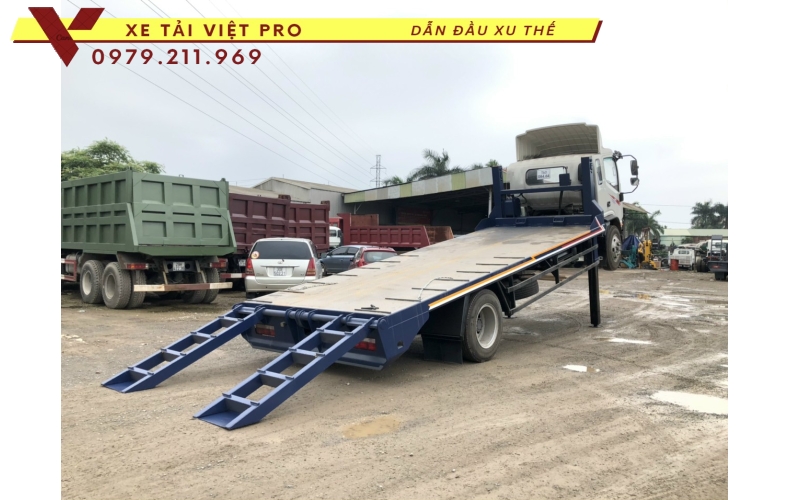 Xe tải JAC N900 nâng đầu chở máy công trình có giá bao nhiêu?